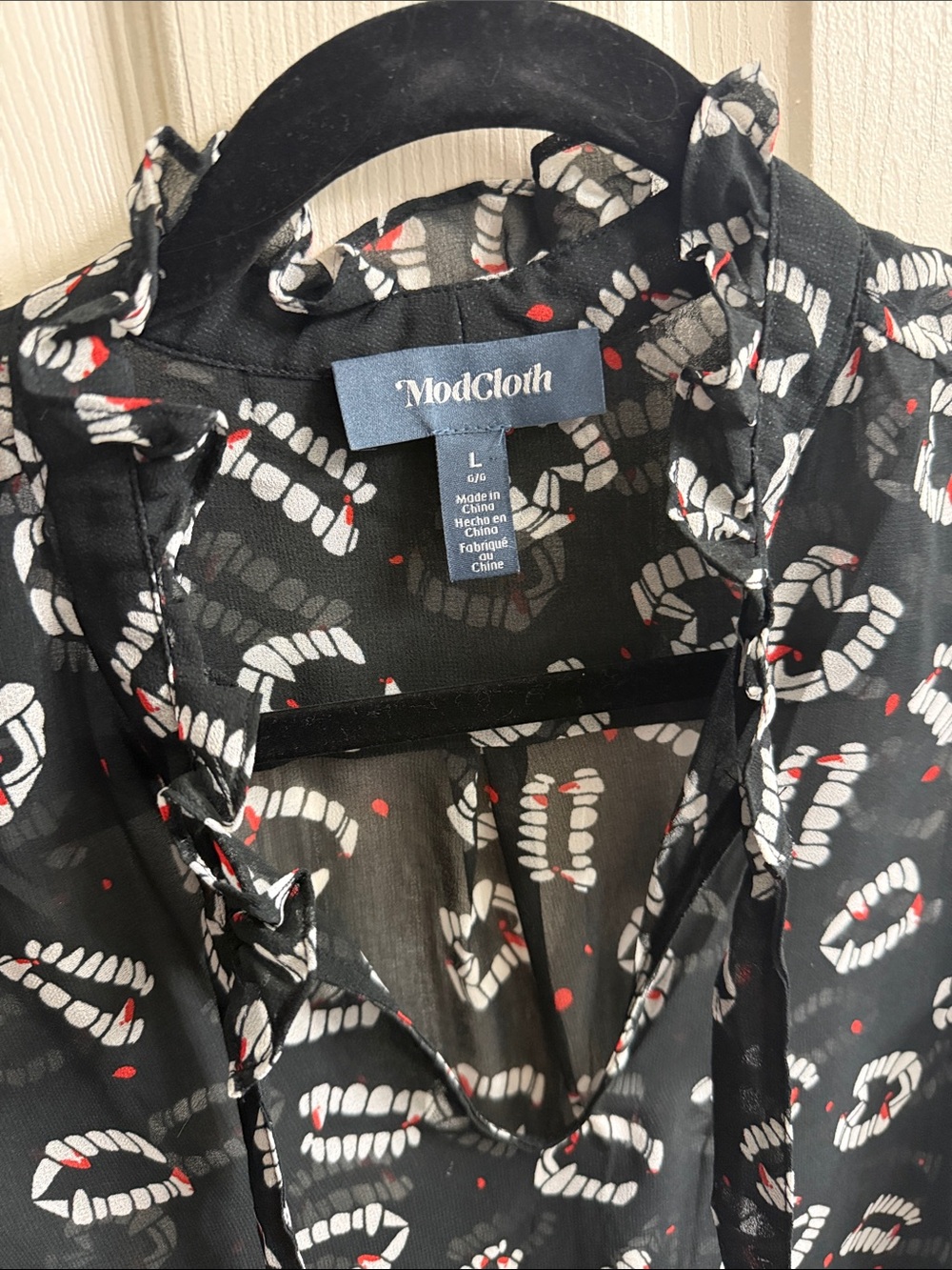 Modcloth Black Sheer Sleeveless Blouse with Vampire Fang Print - Picture 2 of 4